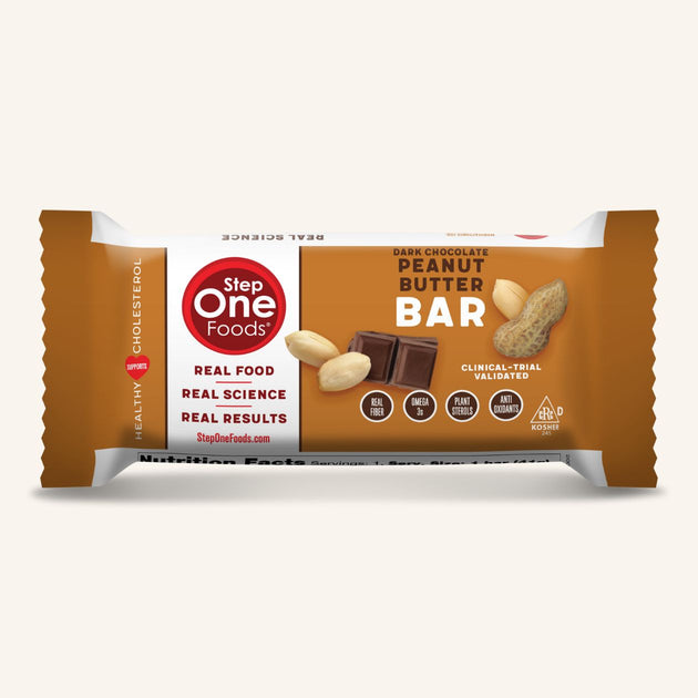 Front View of an individual Dark Chocolate Peanut Butter Bar on a cream colored background, 41g