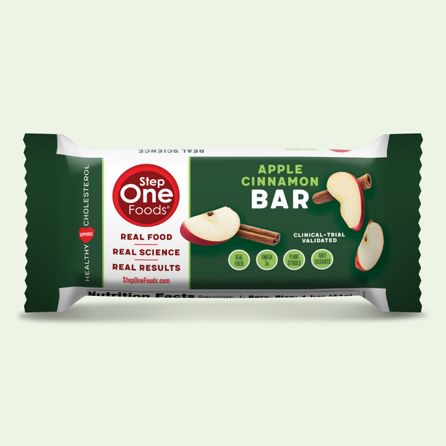 Front View of an individual Apple Cinnamon Bar on a light green colored background, 41g