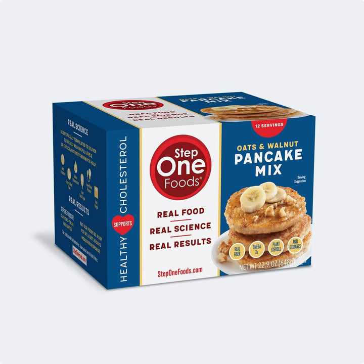 Front View of Whole Oats & Walnut Pancake Mix box of 12 servings on a solid light grey background, 648g