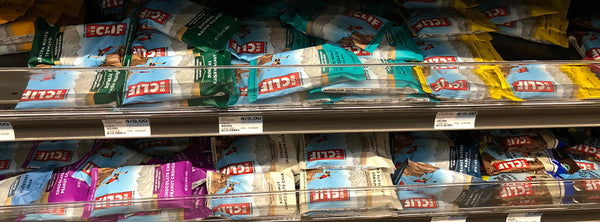 Various flavors of Clif bars on retail shelf
