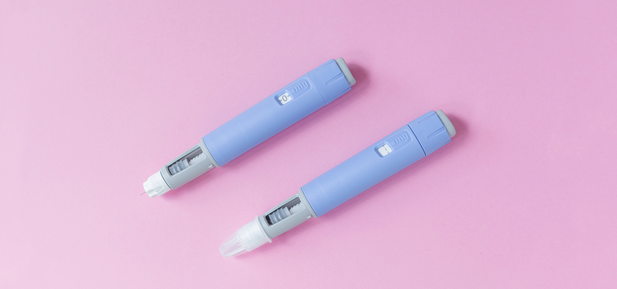 Two injectable cholesterol-lowering medication pens