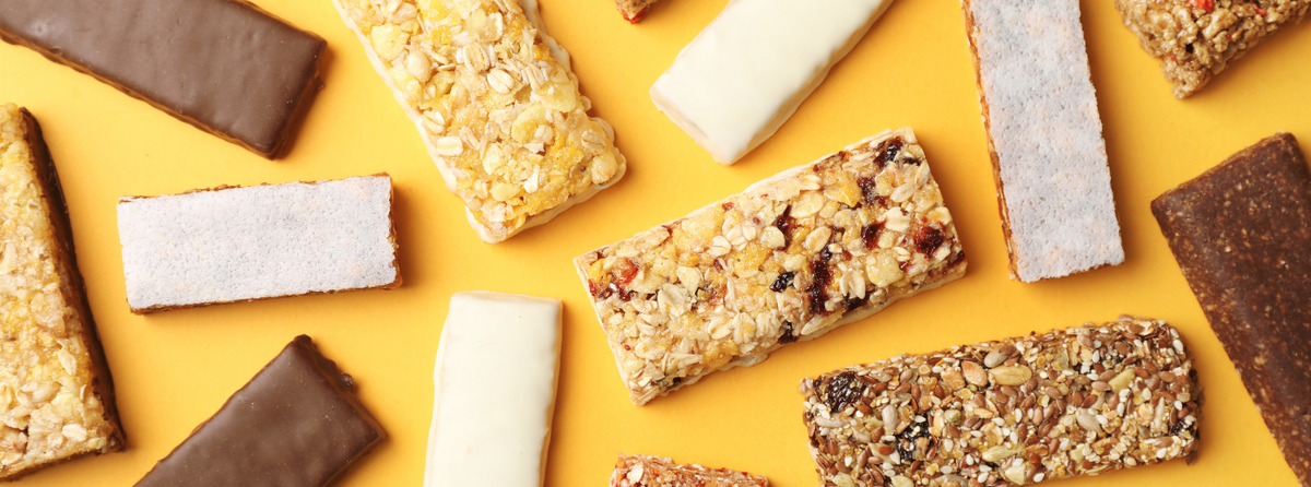 Rows of snack bars on a store shelf