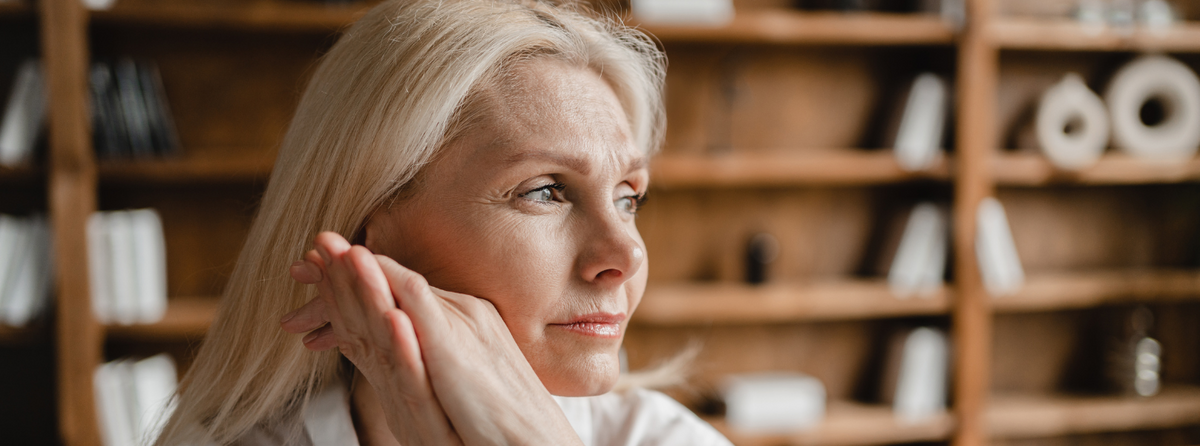 A woman in midlife reviewing her health information